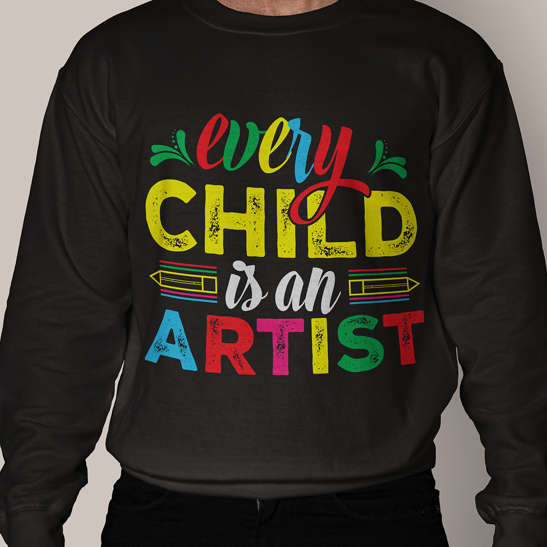 Man wearing a black shirt that says every child is an artist.