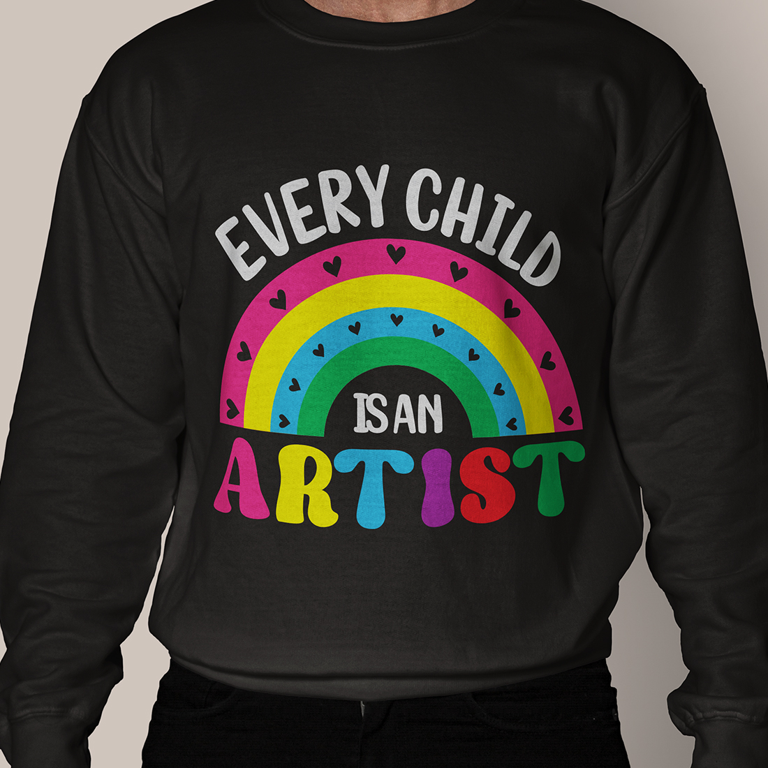 Man wearing a black sweatshirt that says every child is an artist.