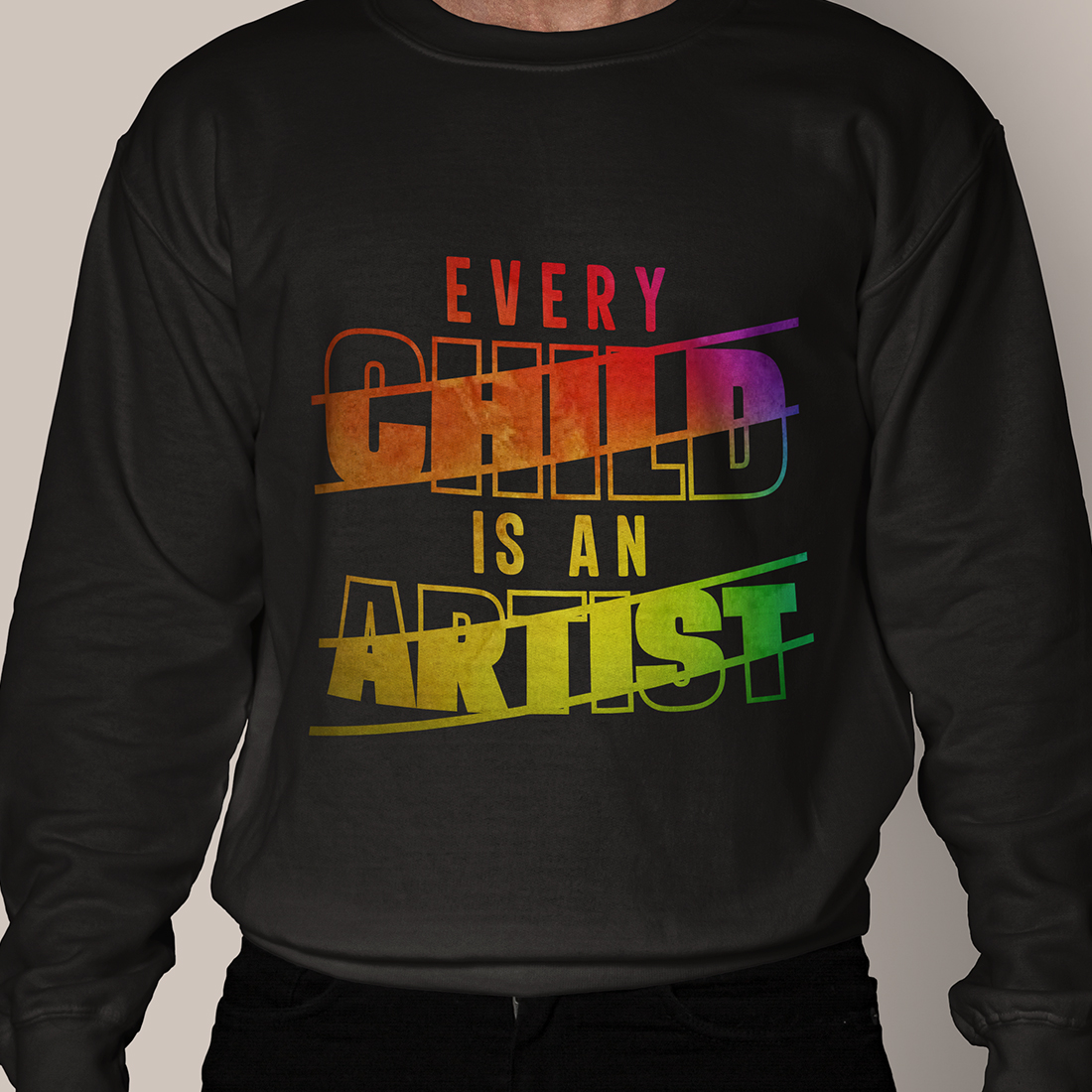 Man wearing a black shirt with the words every child is an artist on it.