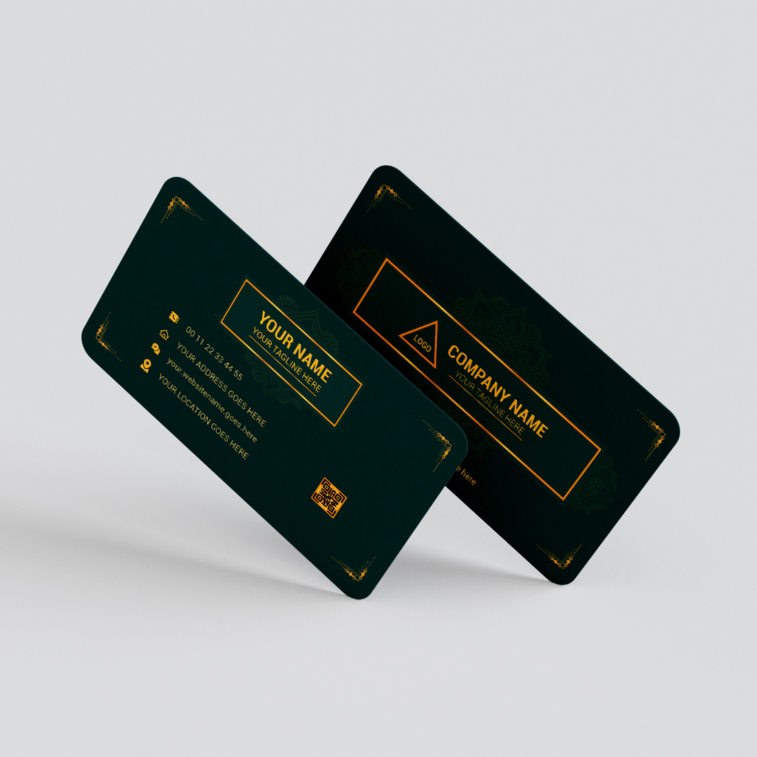 Pair of green business cards sitting on top of each other.