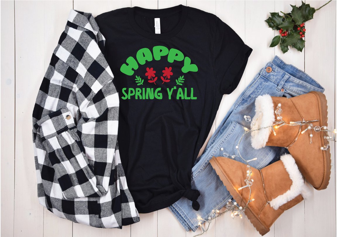 Black shirt that says hoppy spring y'all next to a pair of.