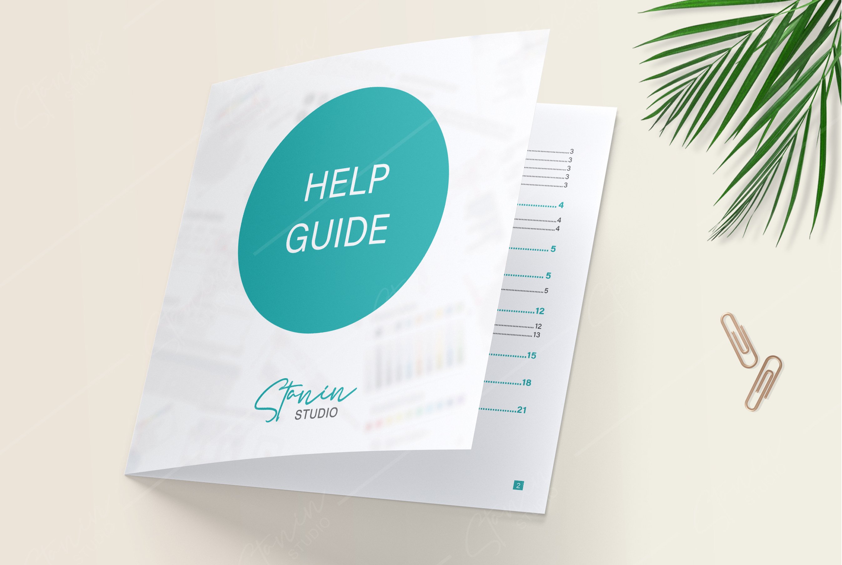 Brochure that says help guide next to a plant.