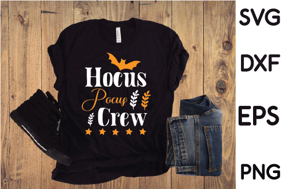 T - shirt that says hoccus paw crew next to a pair of jeans.
