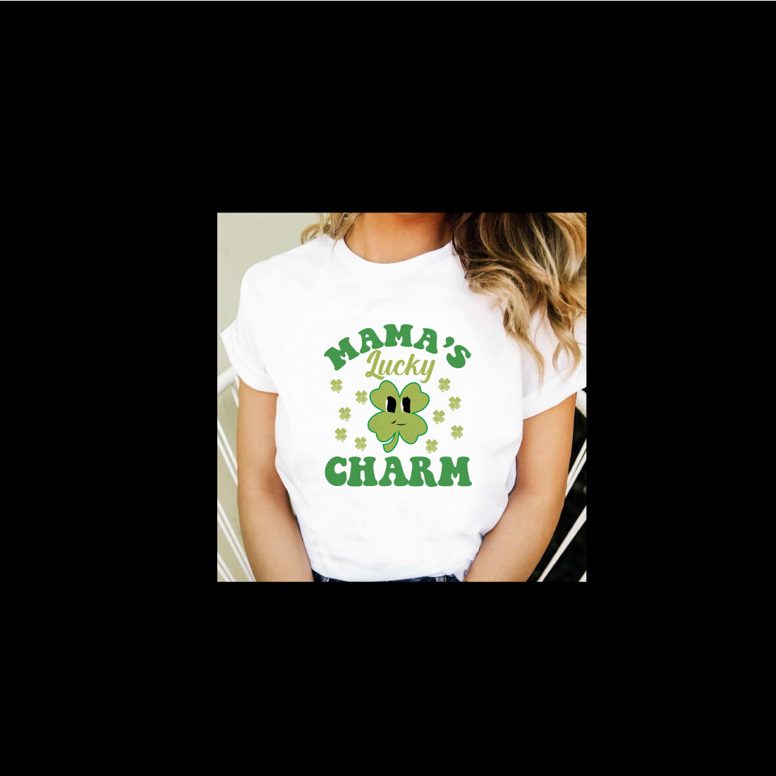 Woman wearing a white shirt that says mama's lucky charm.