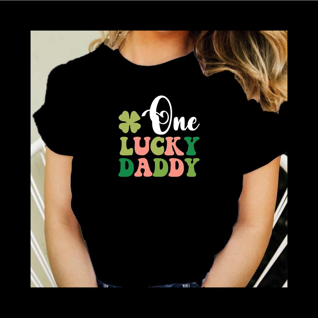 Woman wearing a black shirt that says one lucky daddy.
