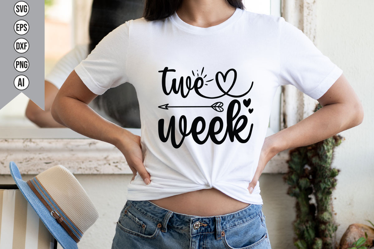 Woman wearing a t - shirt that says two week.