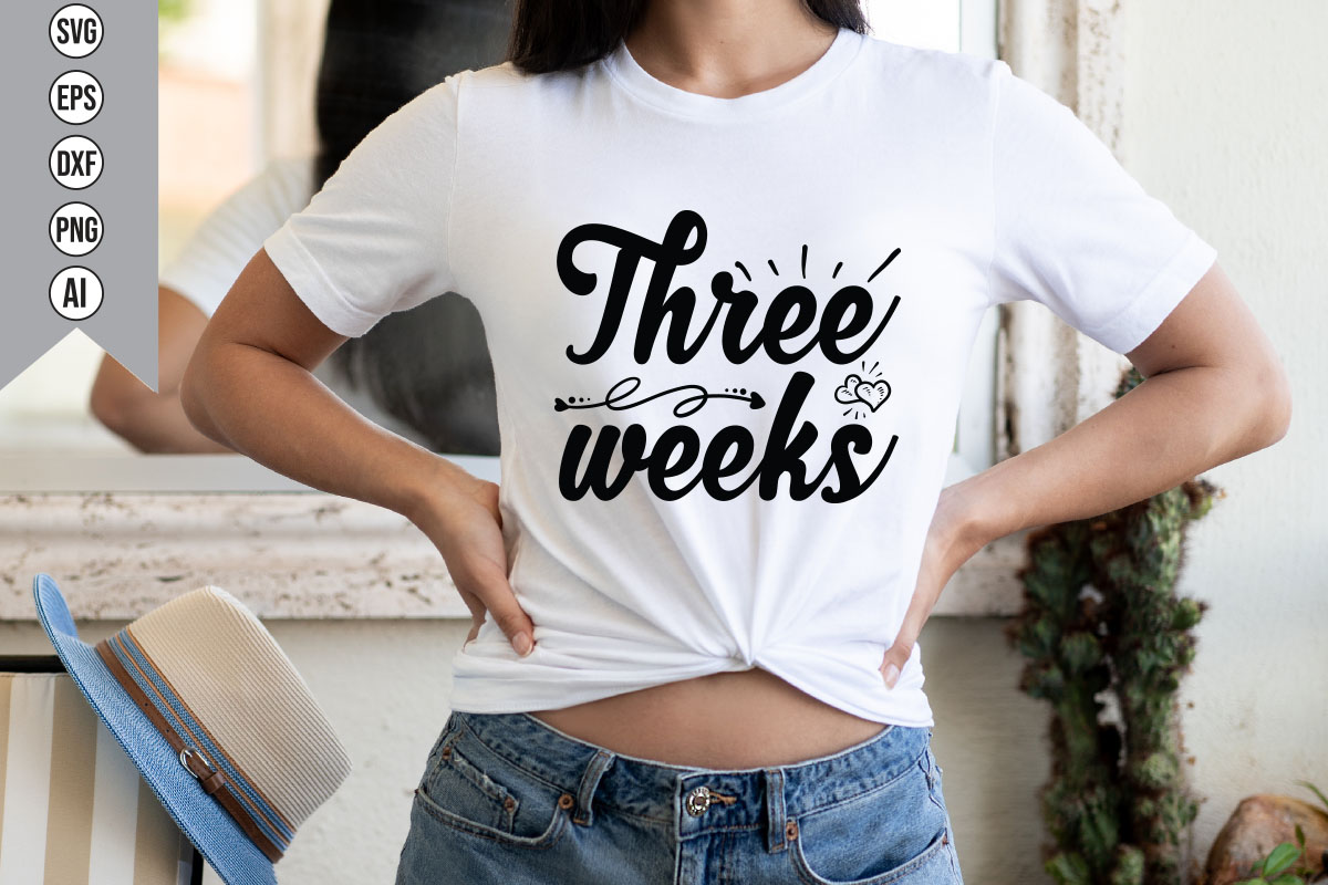 Woman wearing a t - shirt that says three weeks.