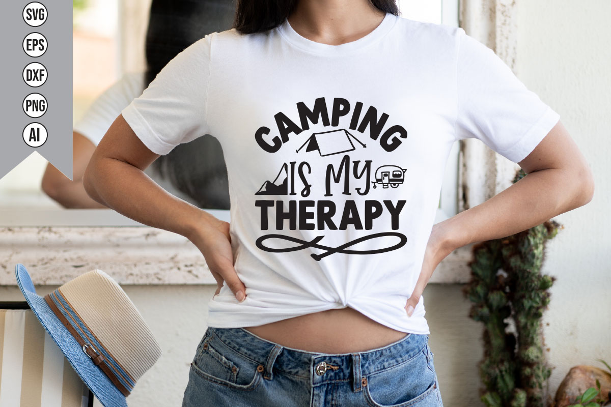 Woman wearing a camping is my therapy shirt.