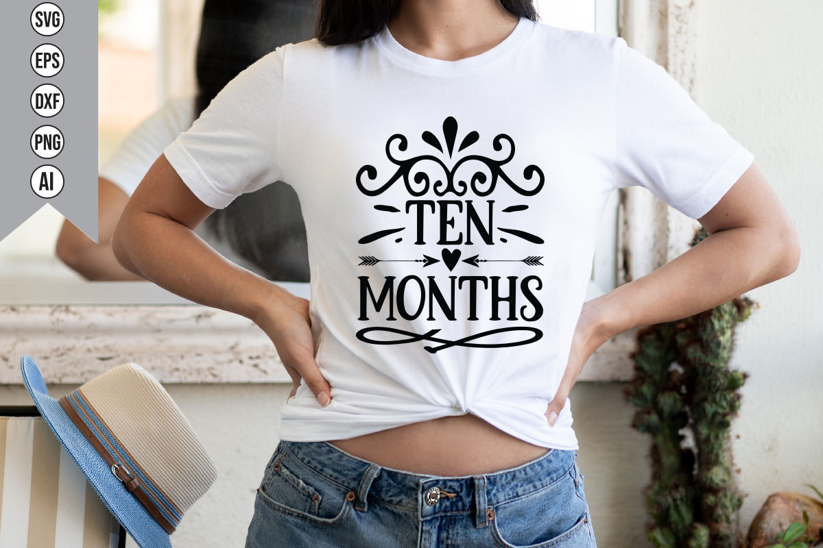 Woman wearing a t - shirt that says ten months.