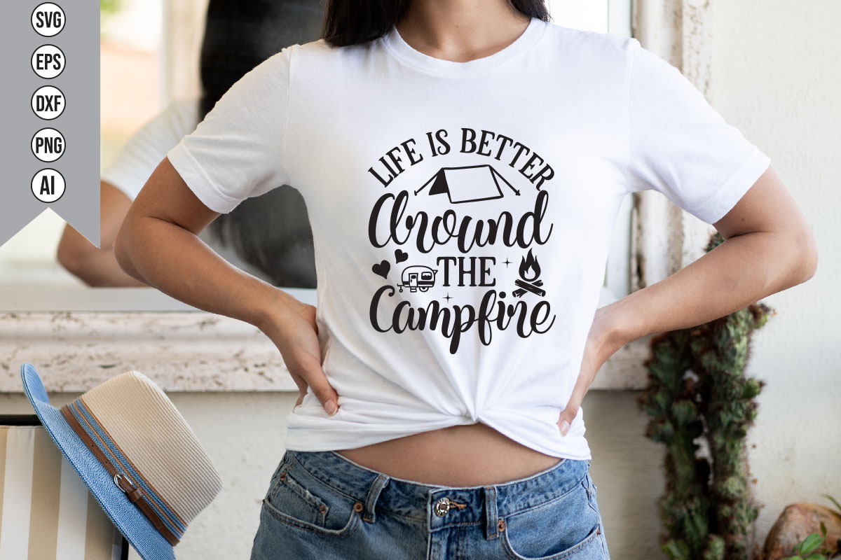 Woman wearing a t - shirt that says life is better around the campfire.
