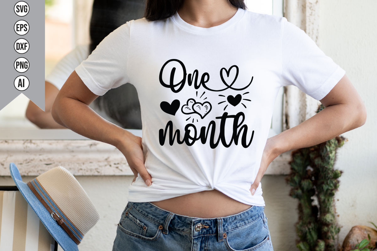 Woman wearing a white shirt with the word one month printed on it.