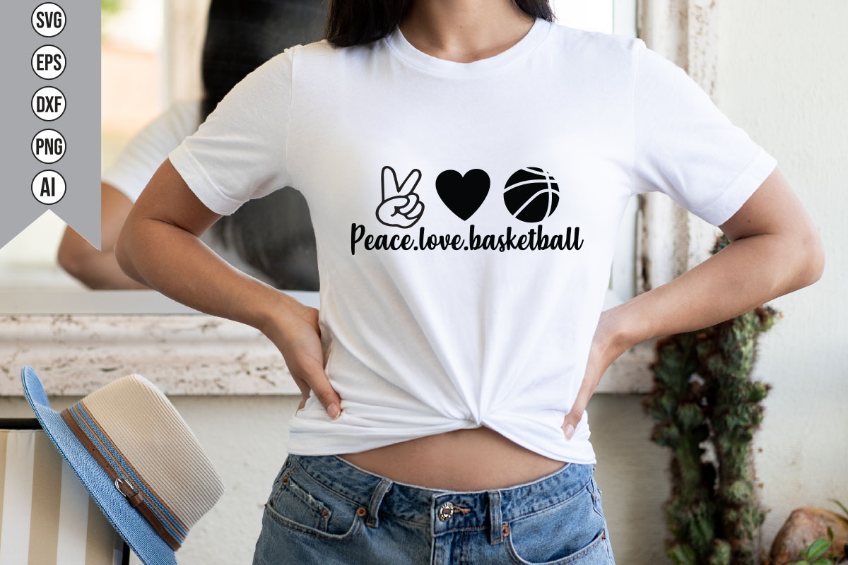 Woman wearing a peace love basketball shirt.