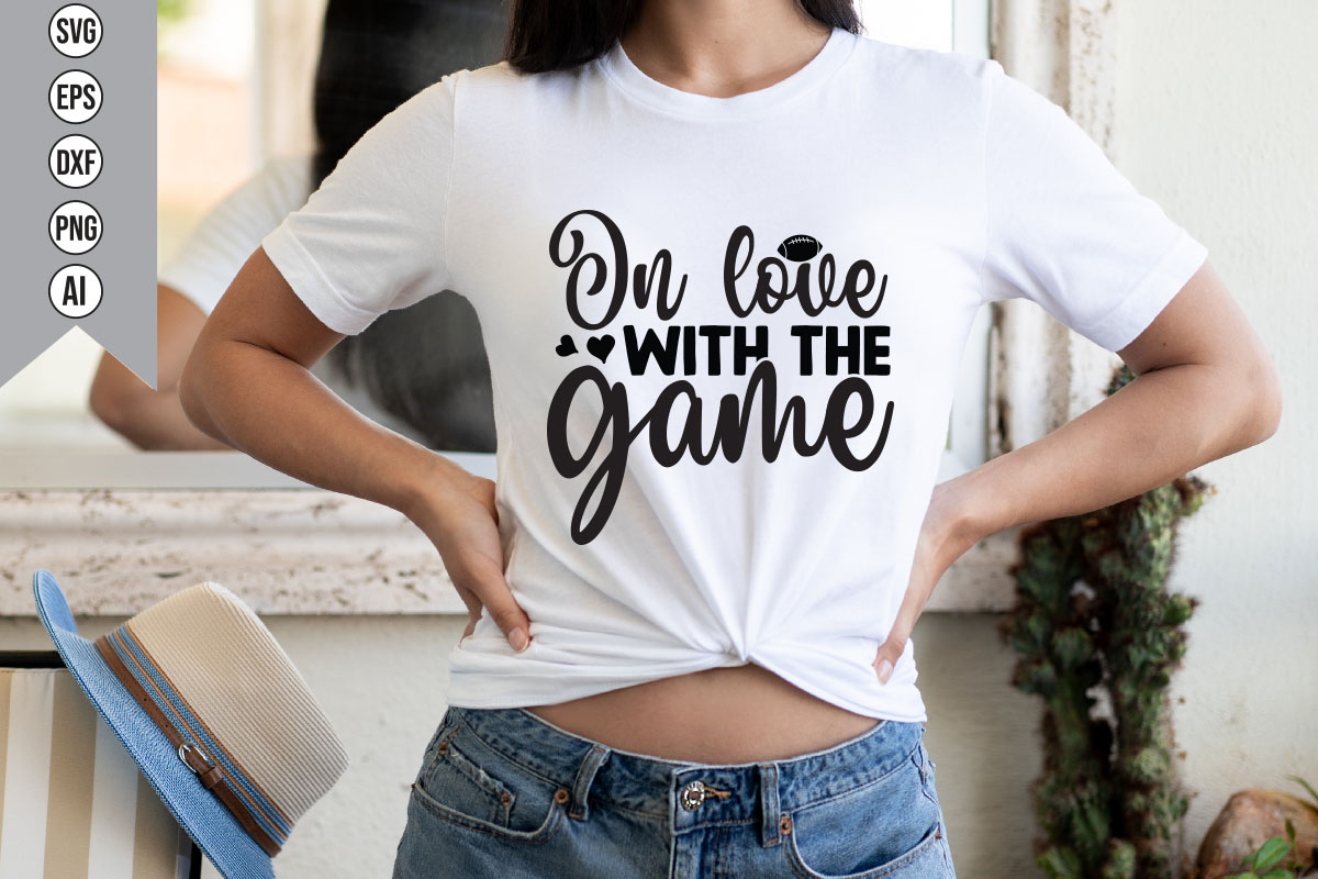 Woman wearing a t - shirt that says oh love with the game.