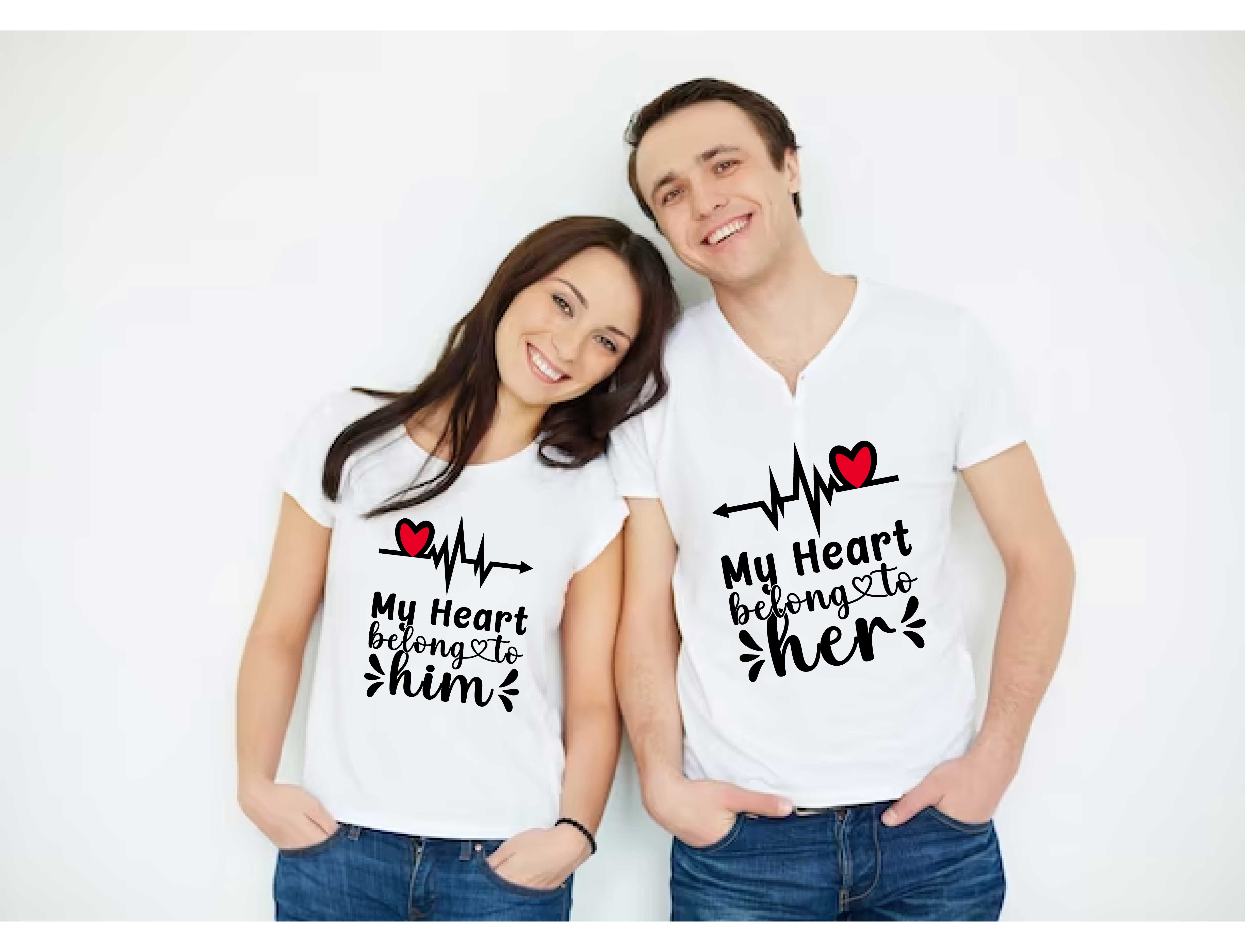 Man and a woman wearing t - shirts with the words my heart belongs to.