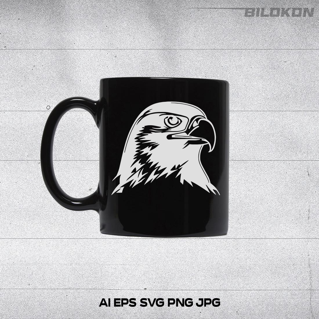Black coffee mug with an eagle's head on it.