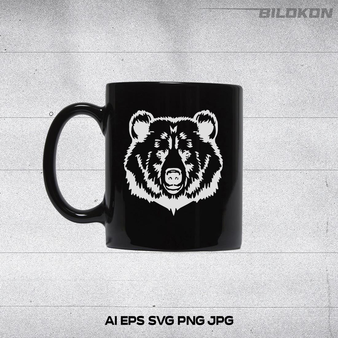 Black coffee mug with a bear on it.
