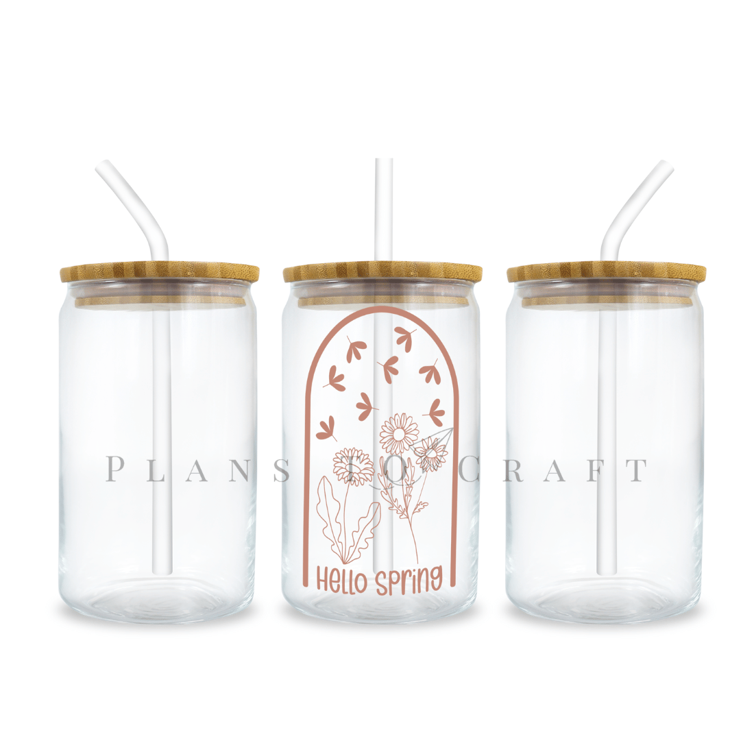 Set of three glass mason jars with straws.