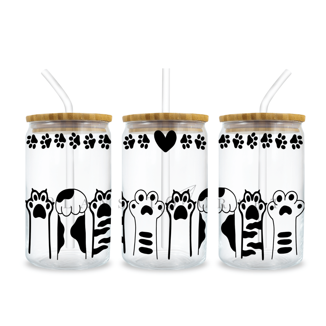 Set of three glass tumblers with cats on them.