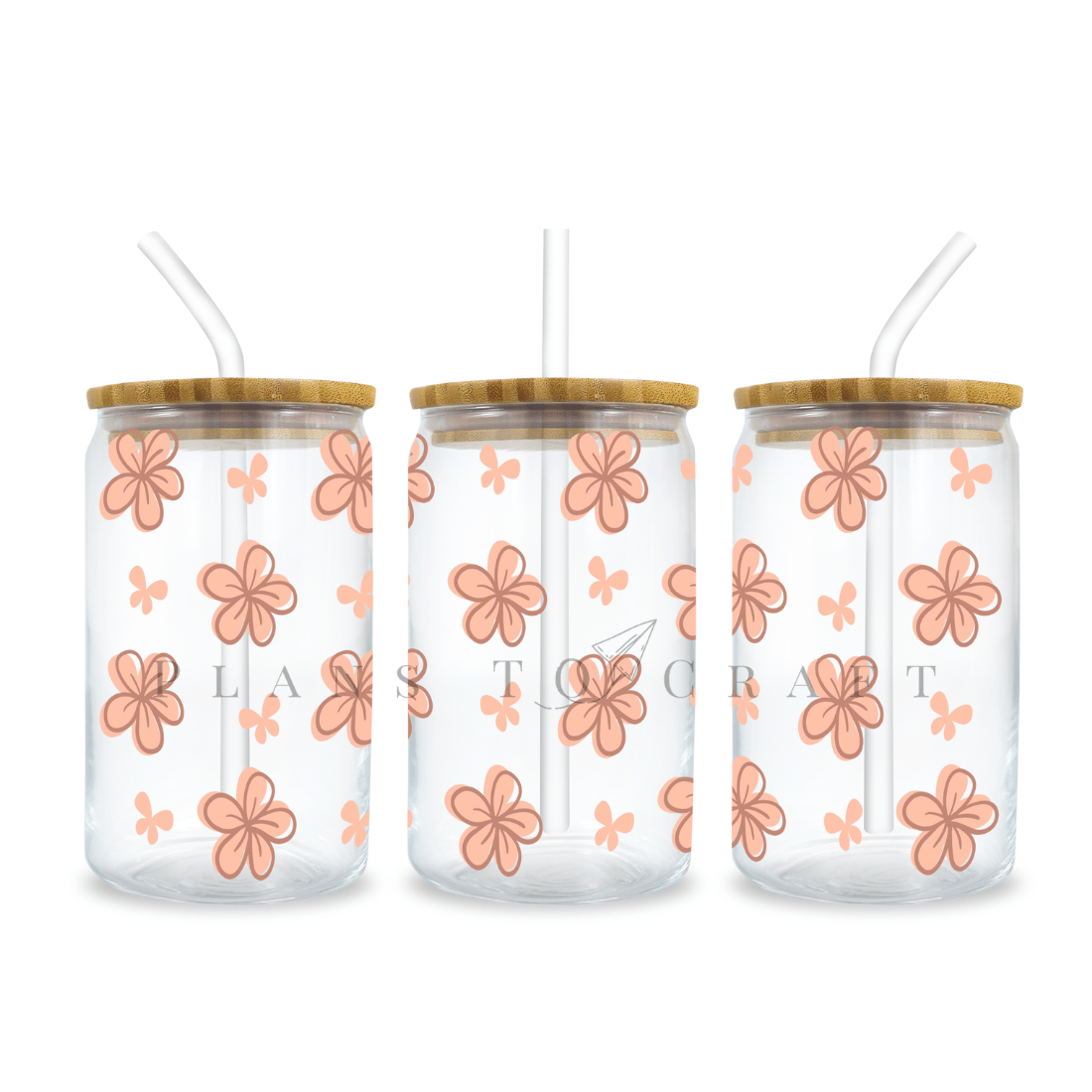 Three glass tumblers with flowers on them.