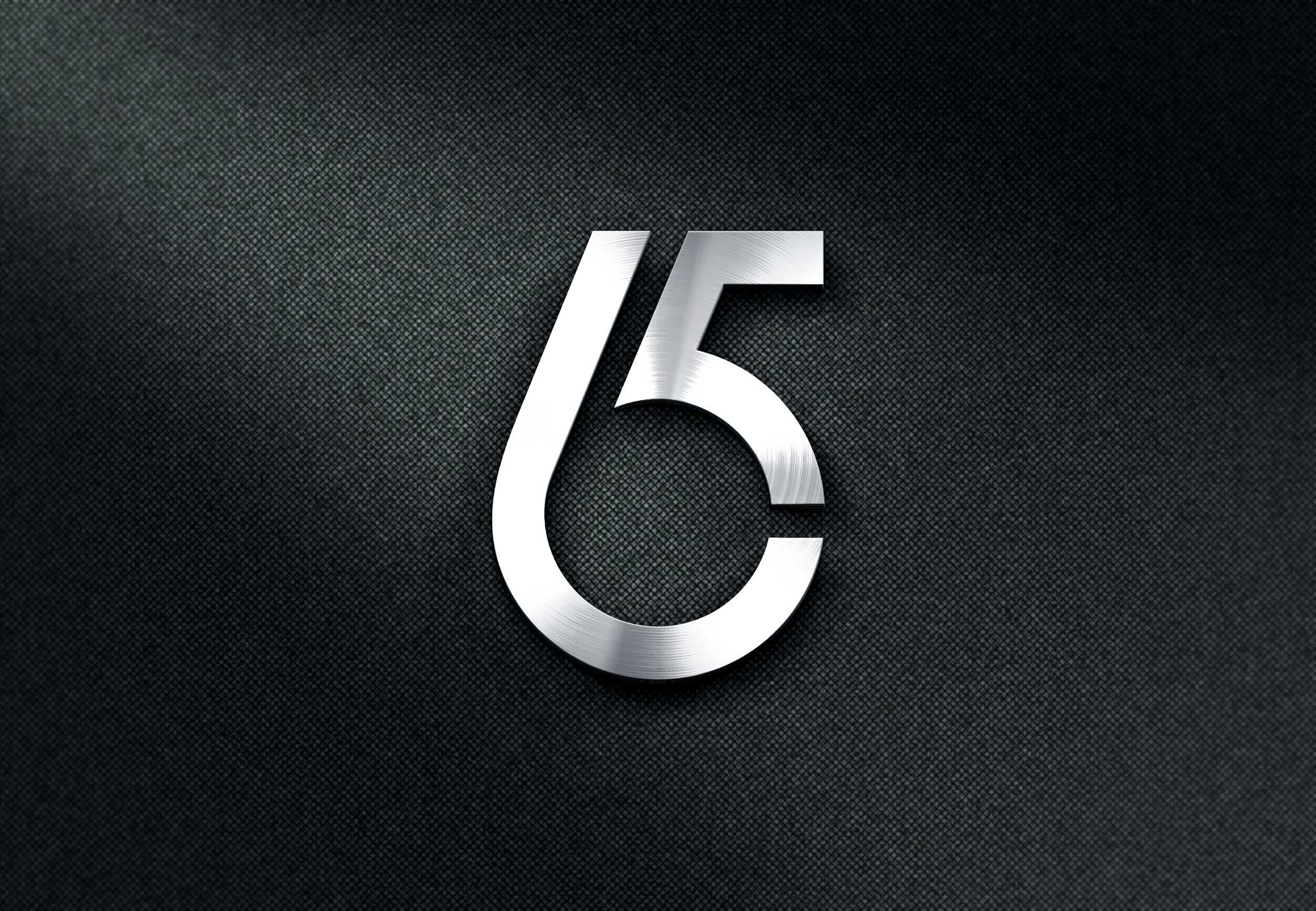 The number five is shown in silver on a black background.