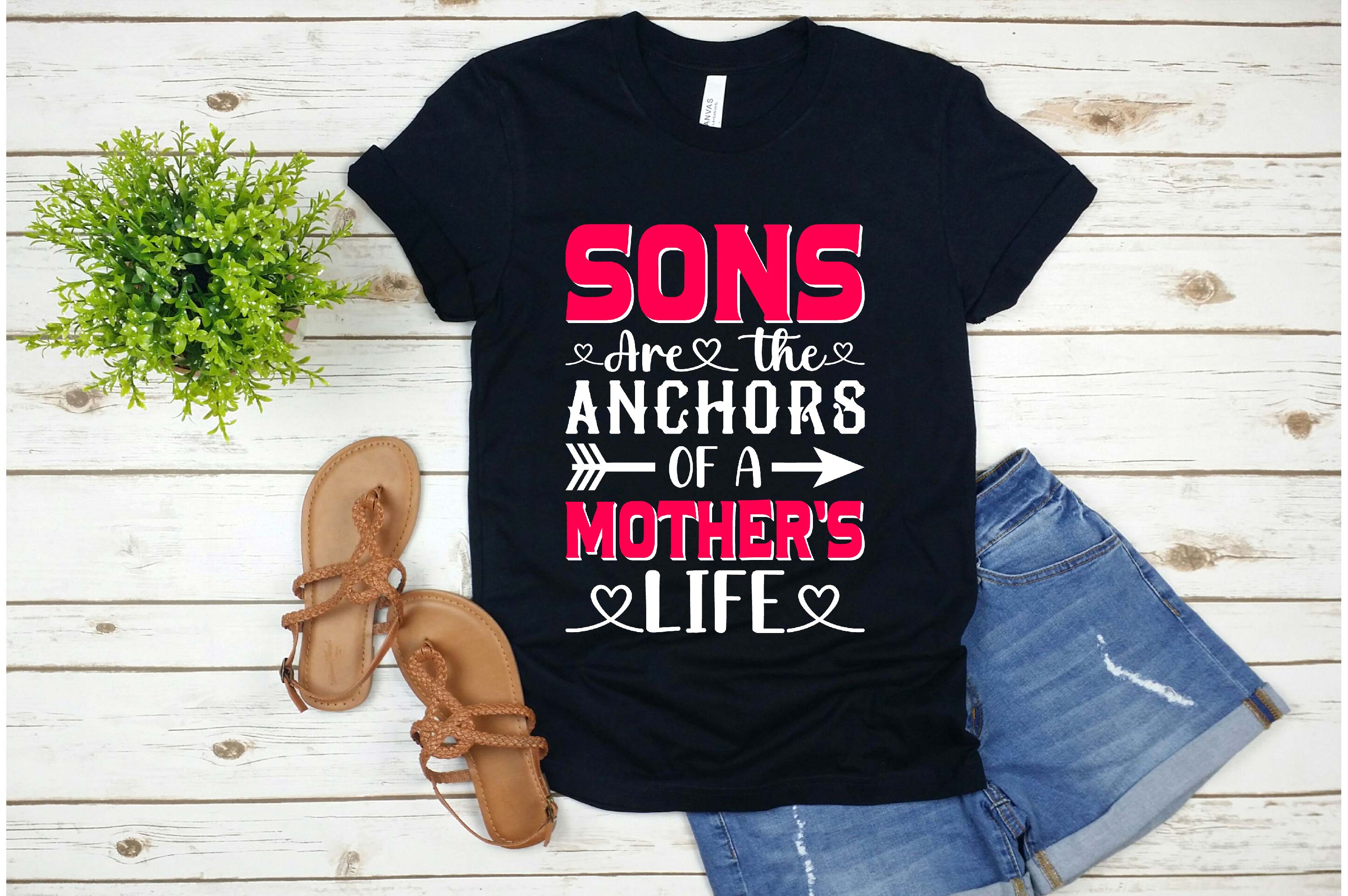T - shirt that says sons are the anchors of a mother's life.