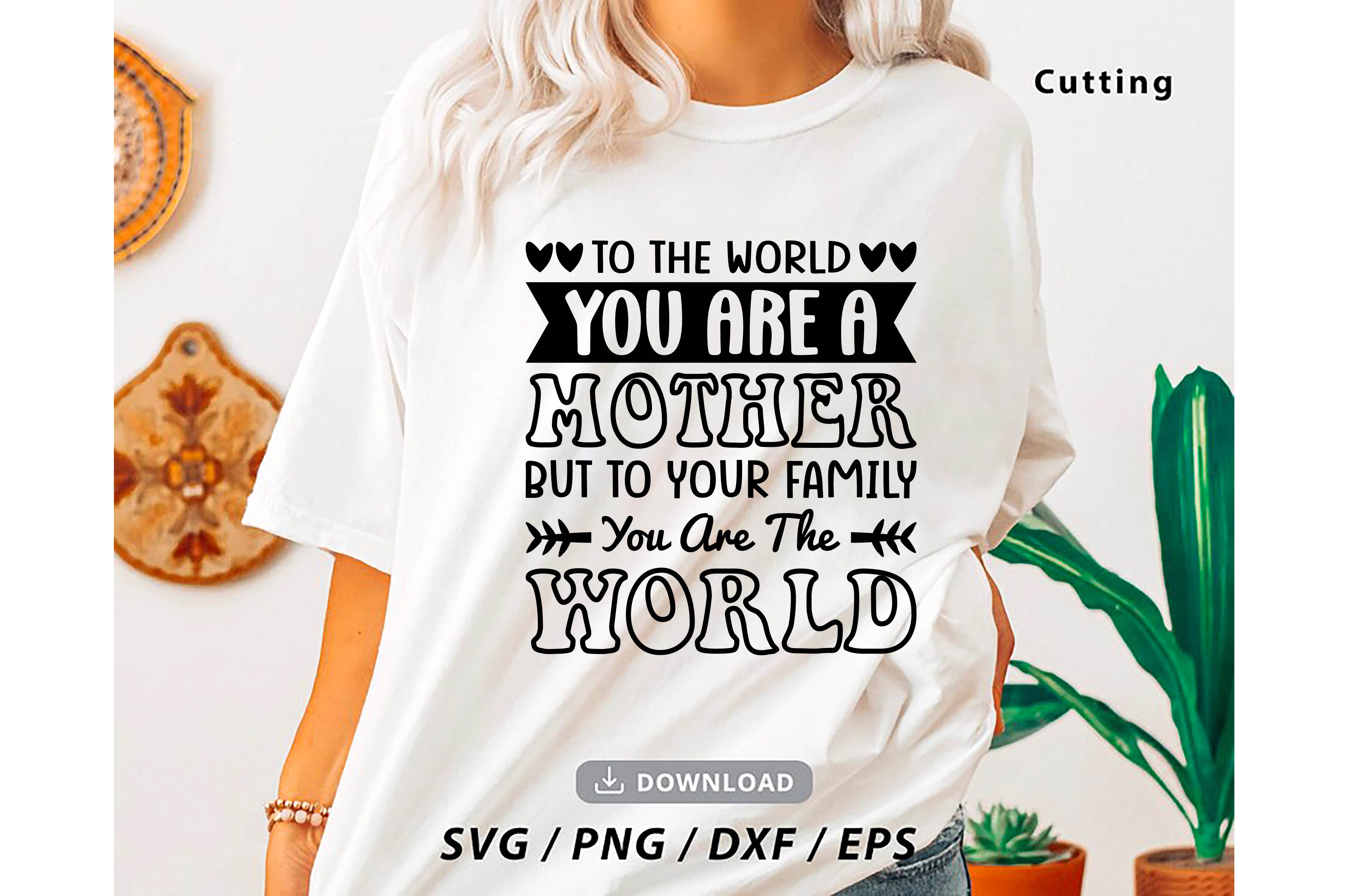 Woman wearing a t - shirt that says to the world you are a mother.