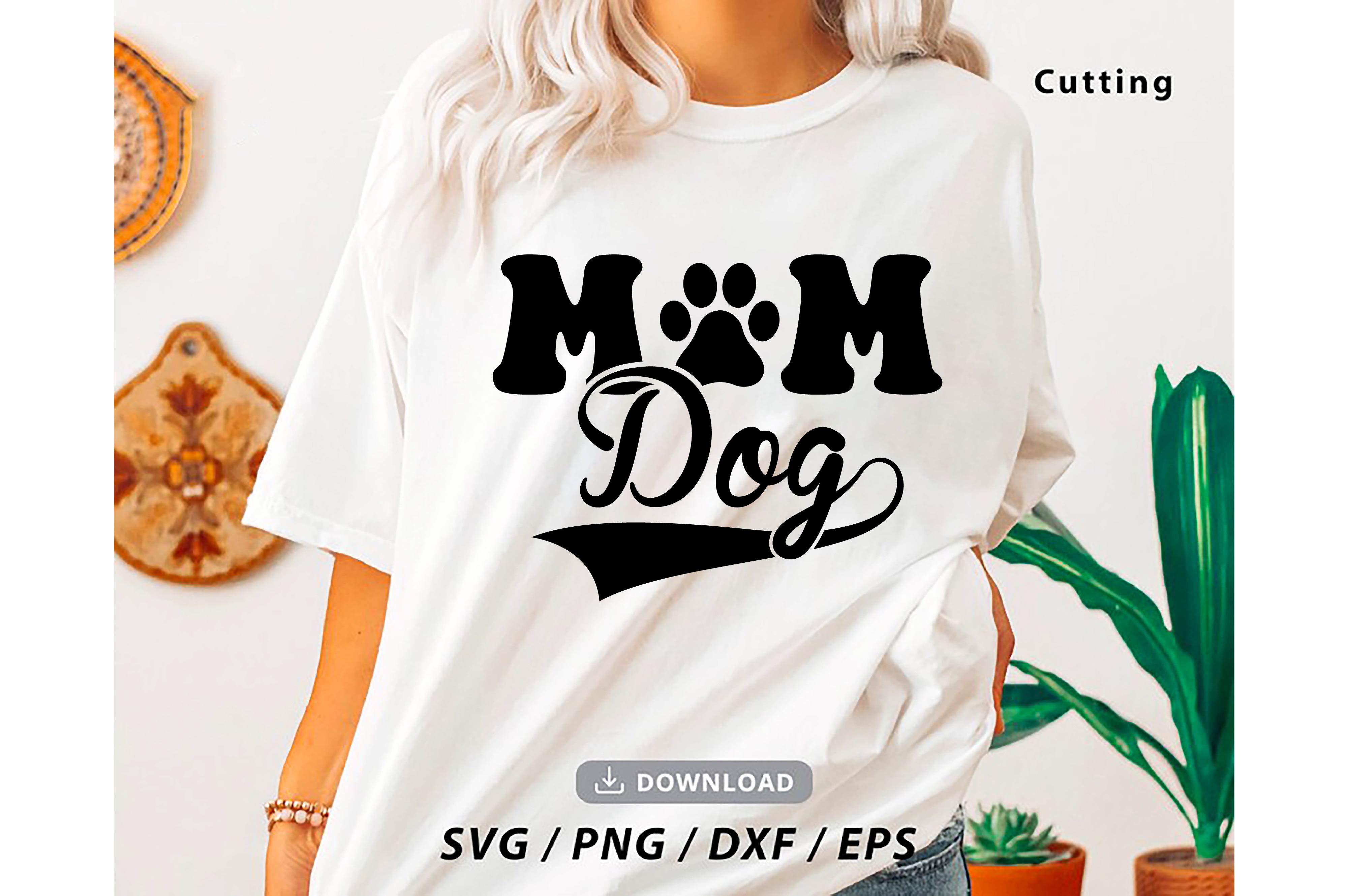 Woman wearing a t - shirt that says mom dog.