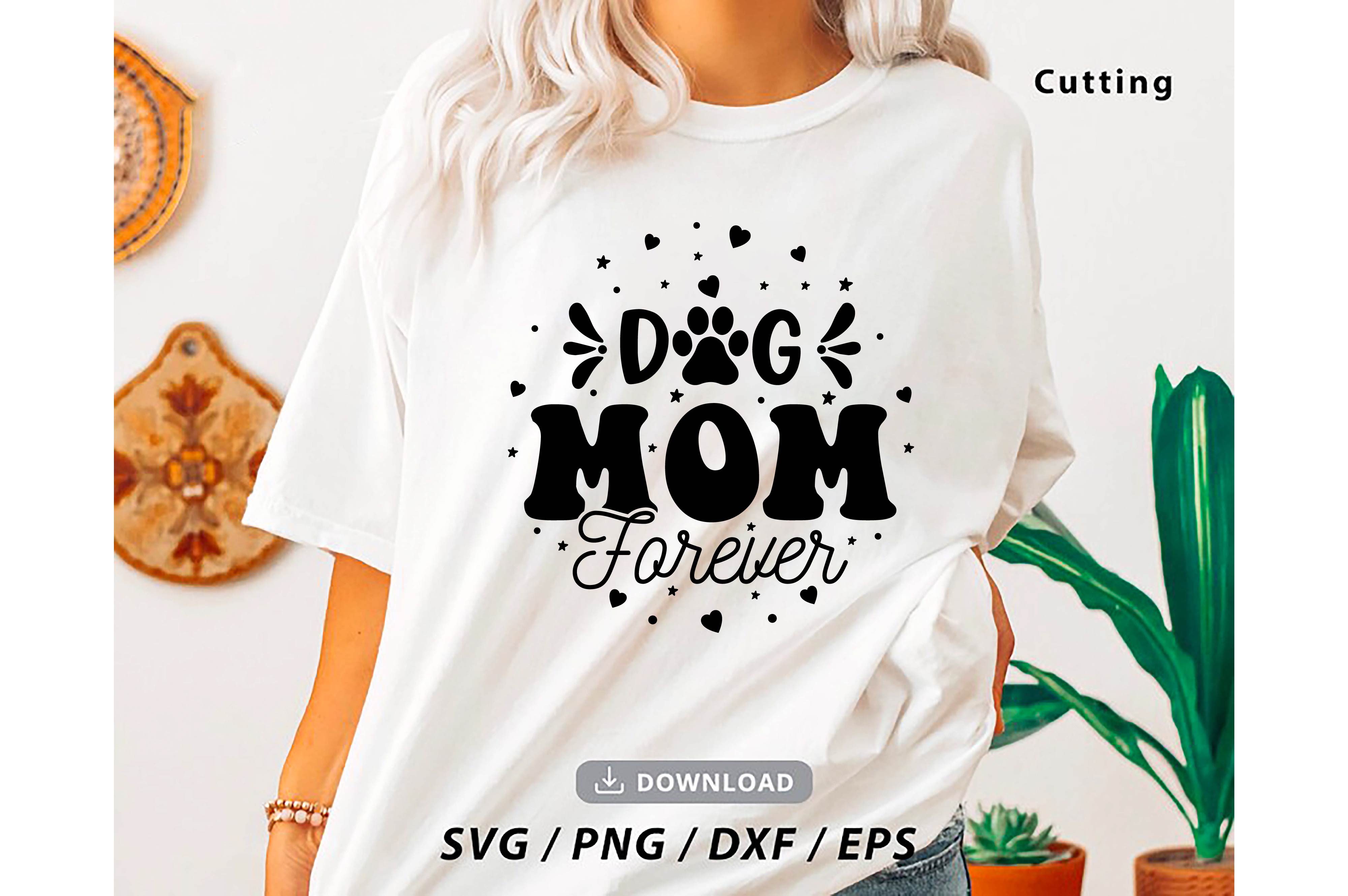 Woman wearing a t - shirt that says dog mom forever.