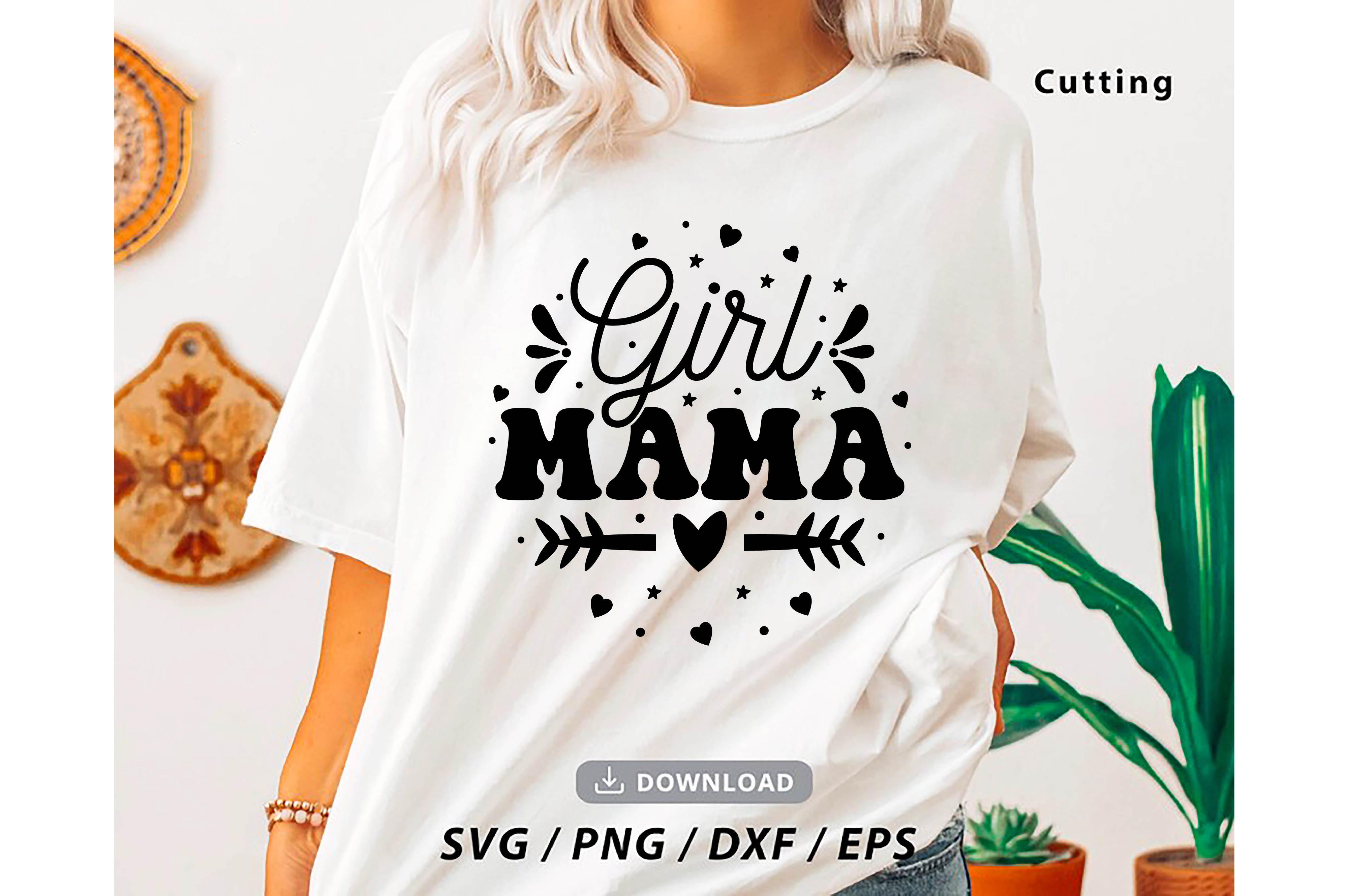 Woman wearing a white shirt that says girl mama.