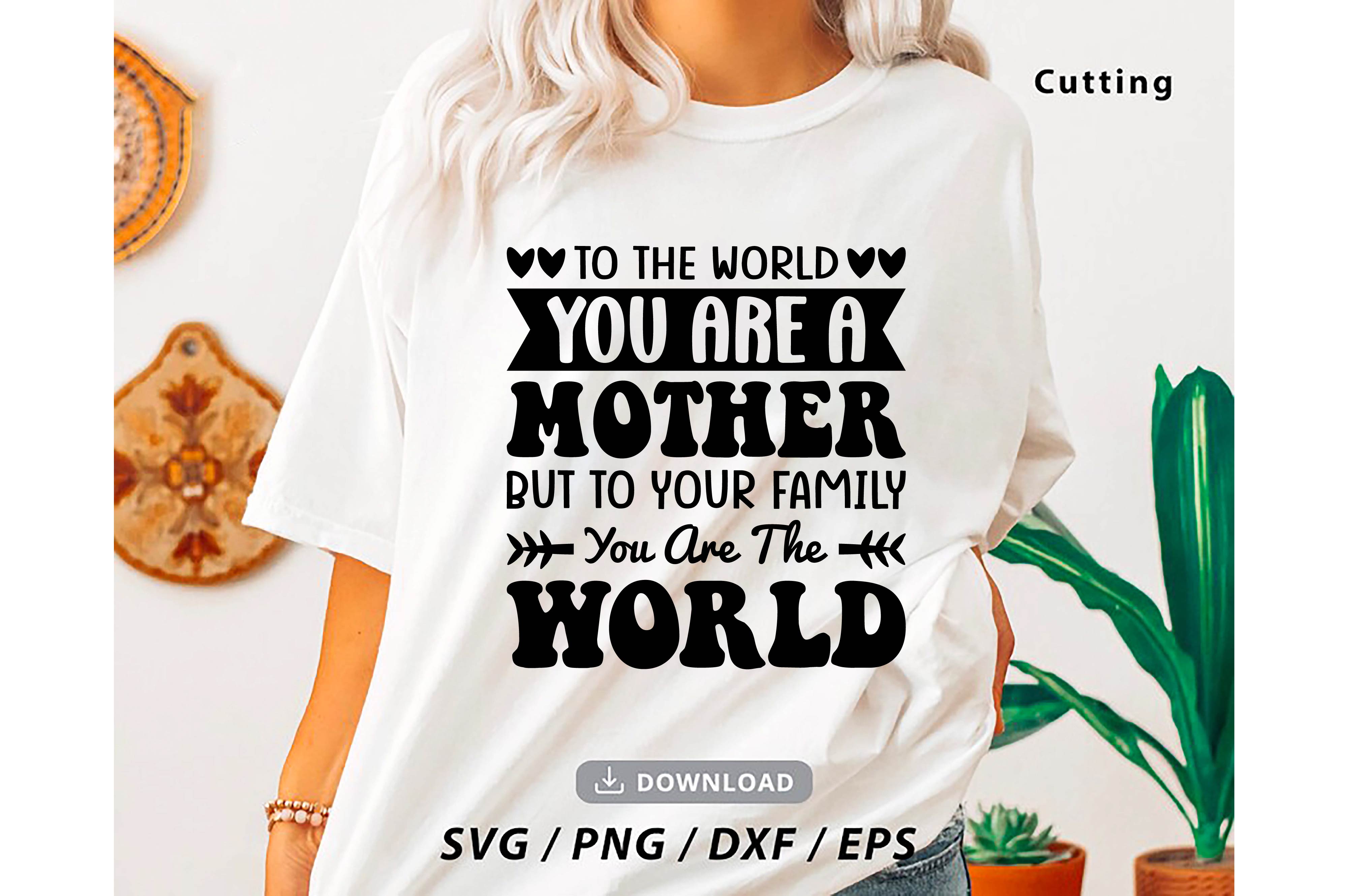 Woman wearing a t - shirt that says to the world you are a mother.