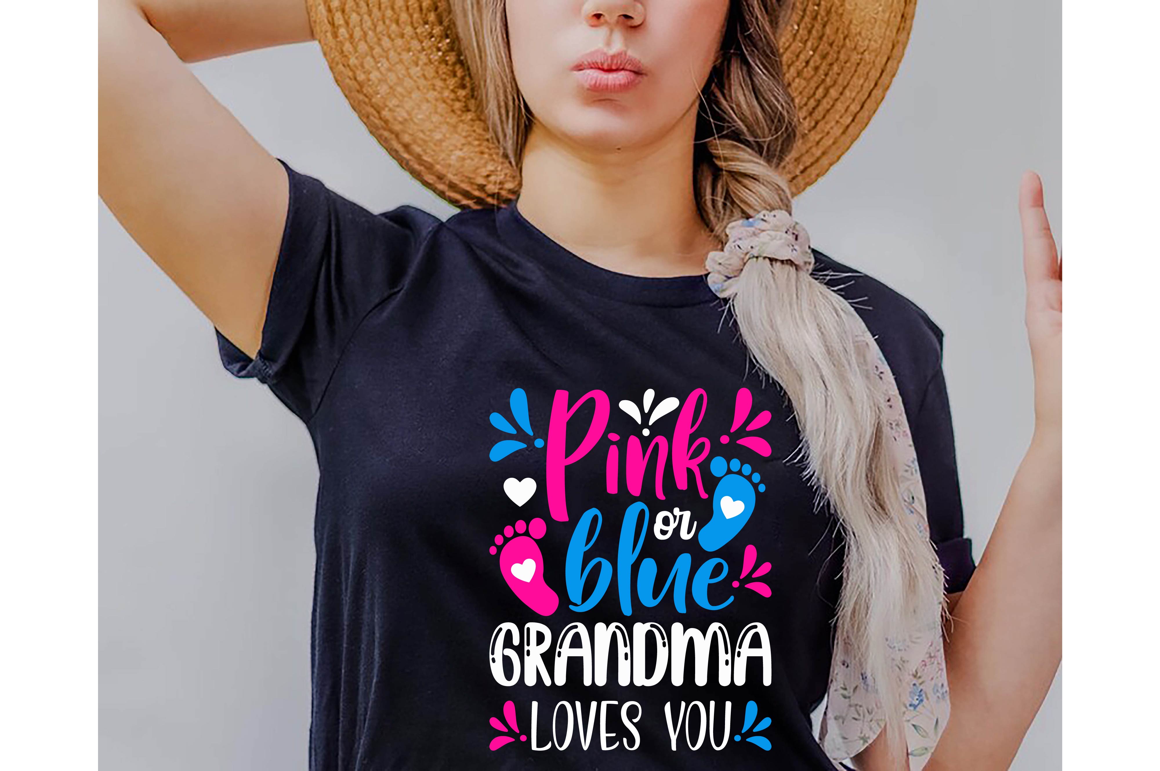 Woman wearing a pink or blue grandma loves you t - shirt.