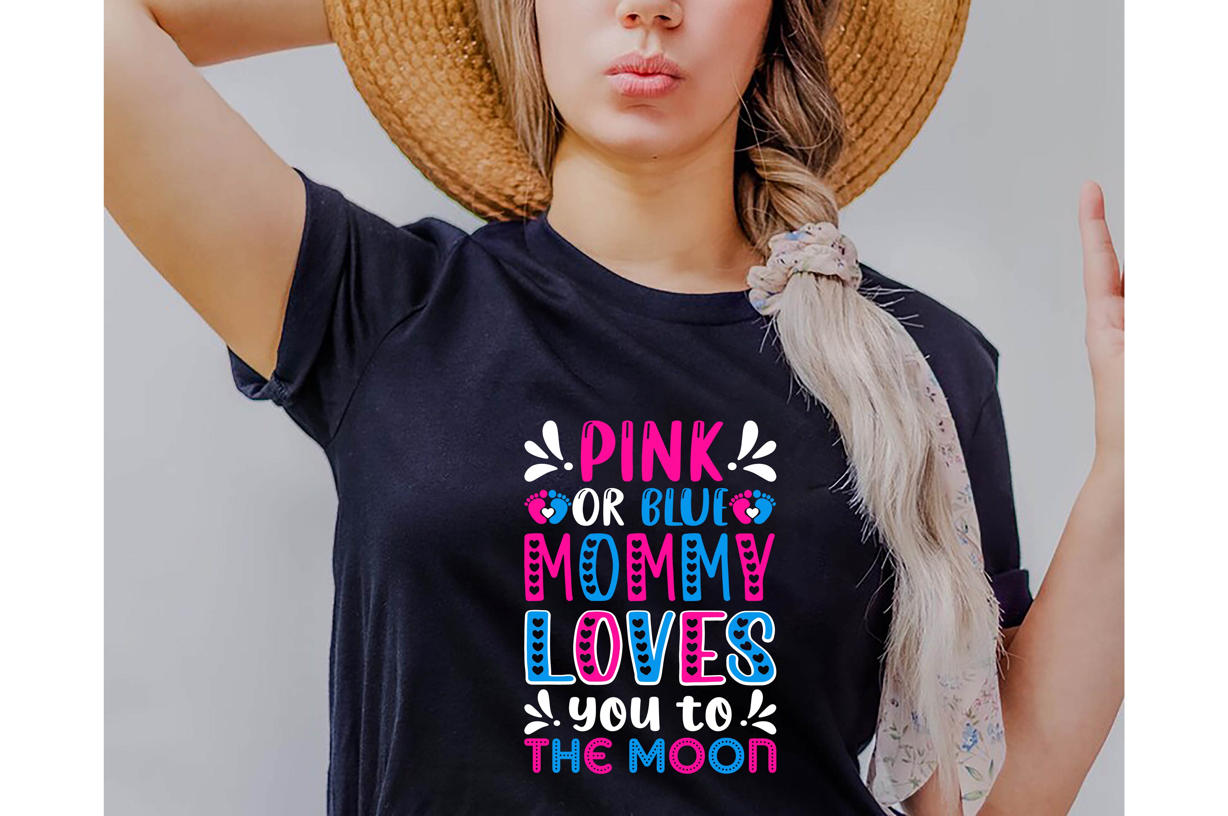 Woman wearing a black shirt with pink or blue lettering on it.