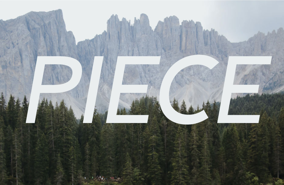 Picture of a mountain range with the words piece in front of it.