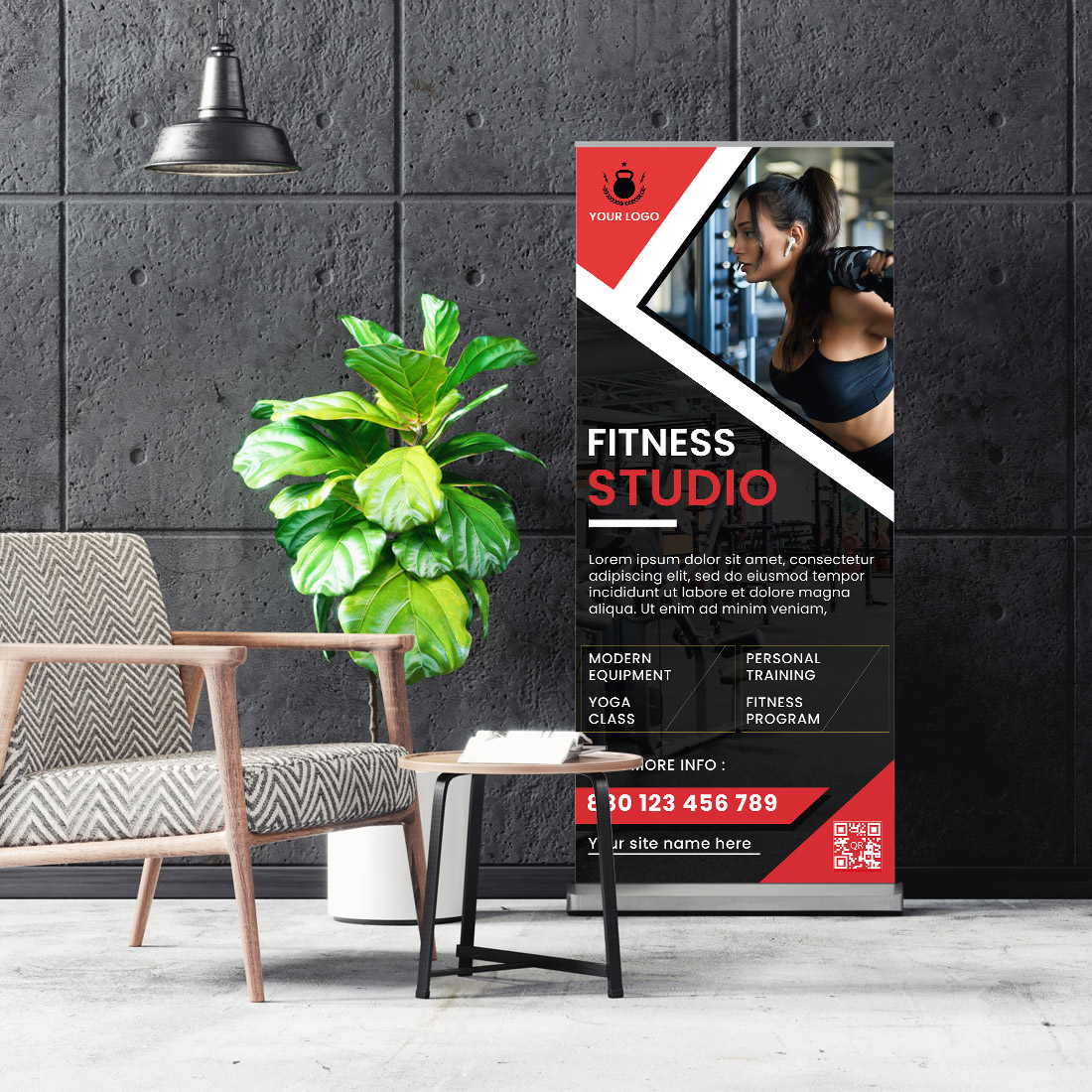 Fitness studio sign next to a chair and a potted plant.