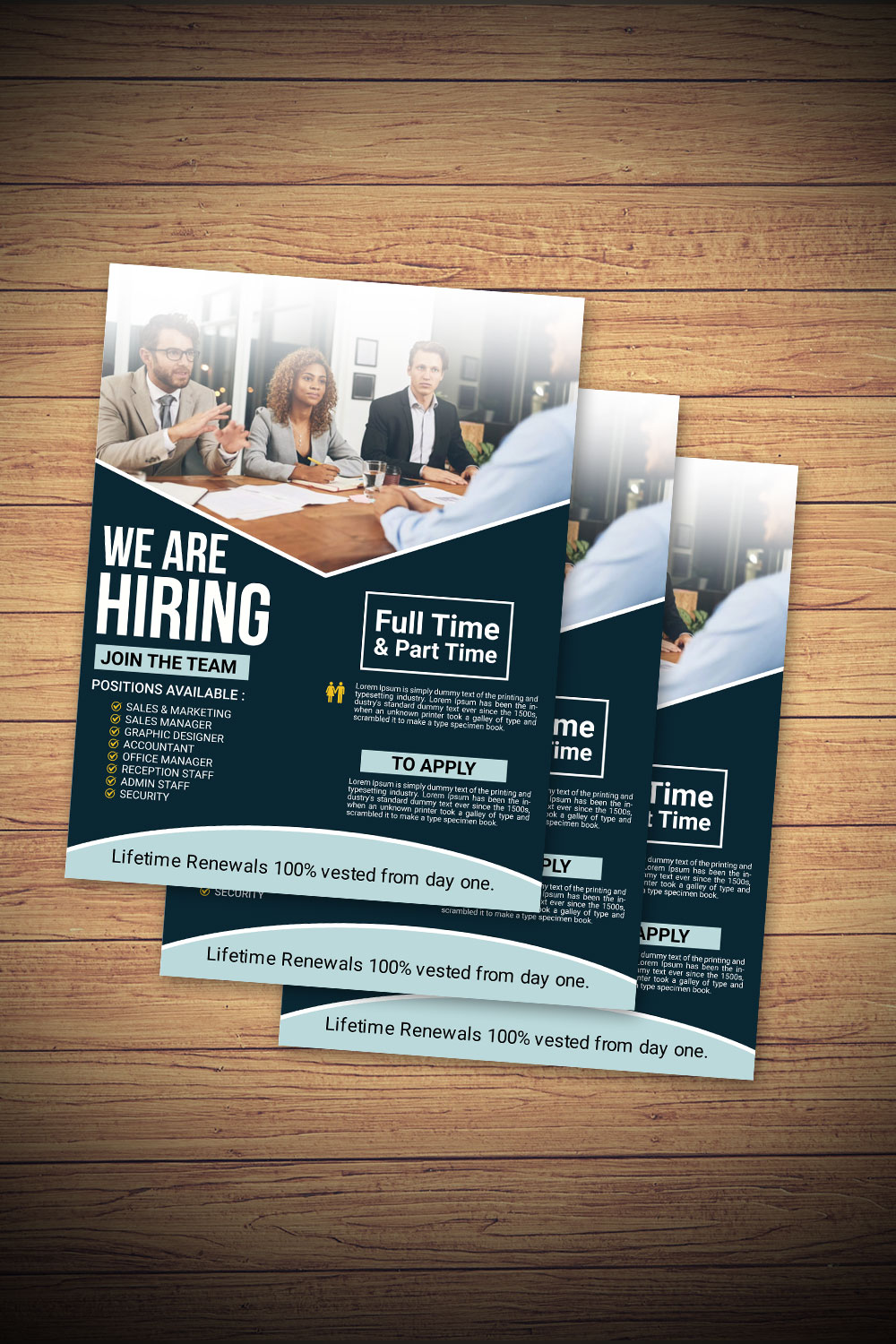 Set of three business flyers on a wooden table.