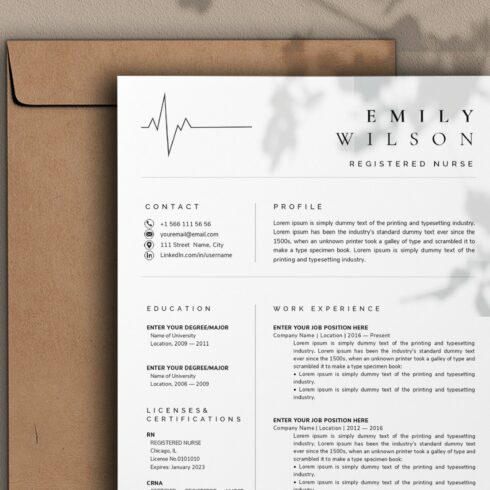 Professional resume is displayed on a piece of paper.