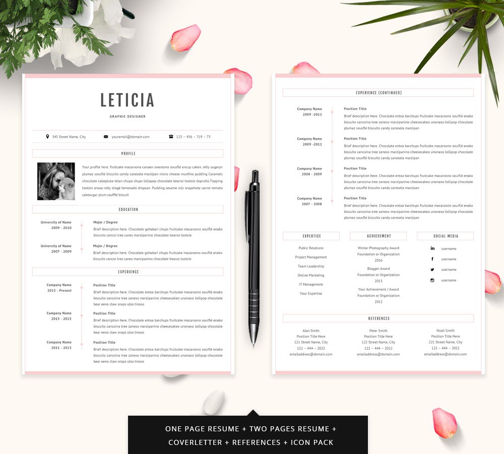Pink and white resume on a table with flowers.