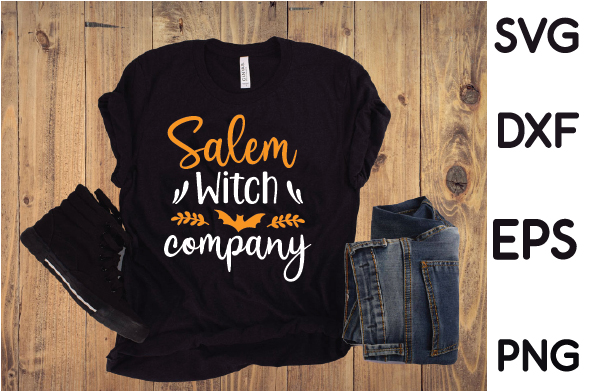 T - shirt that says salem witch company next to a pair of jeans.