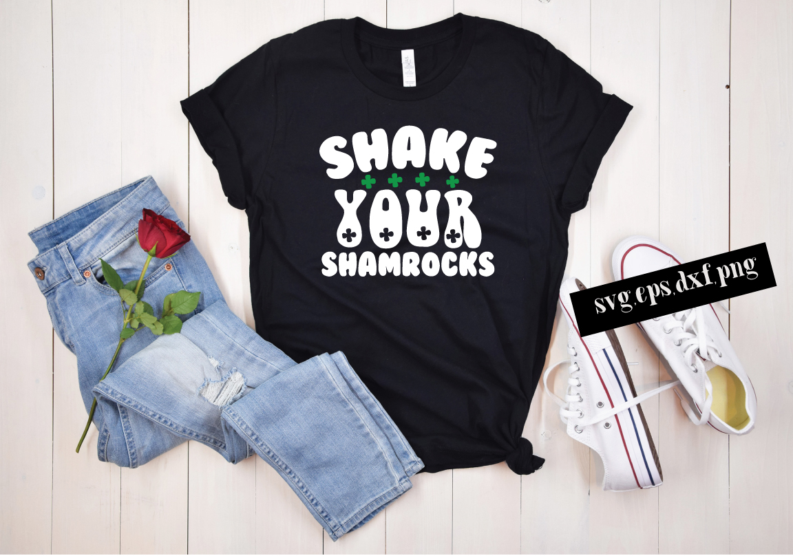 T - shirt that says shake your shamrocks on it.