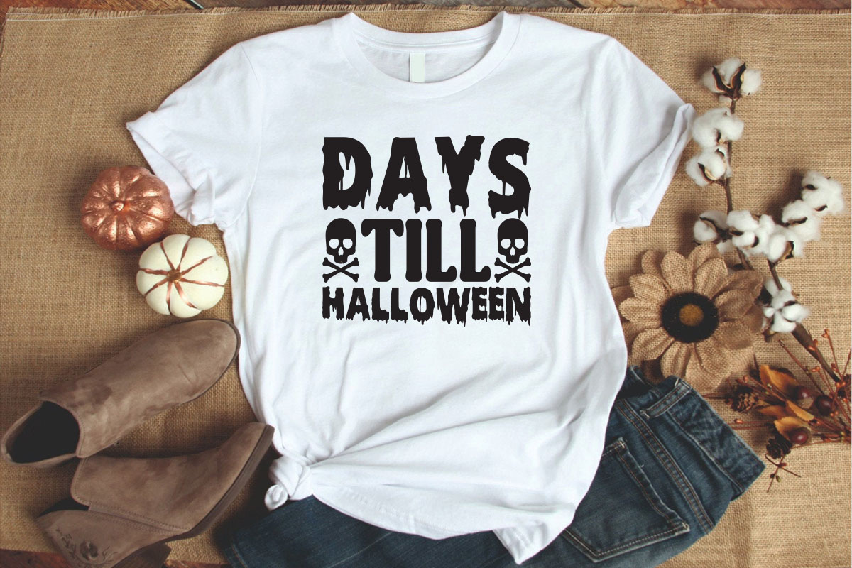 White t - shirt that says days till halloween.