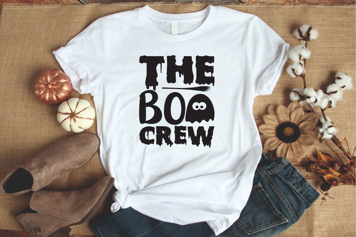 T - shirt that says the boo crew on it.