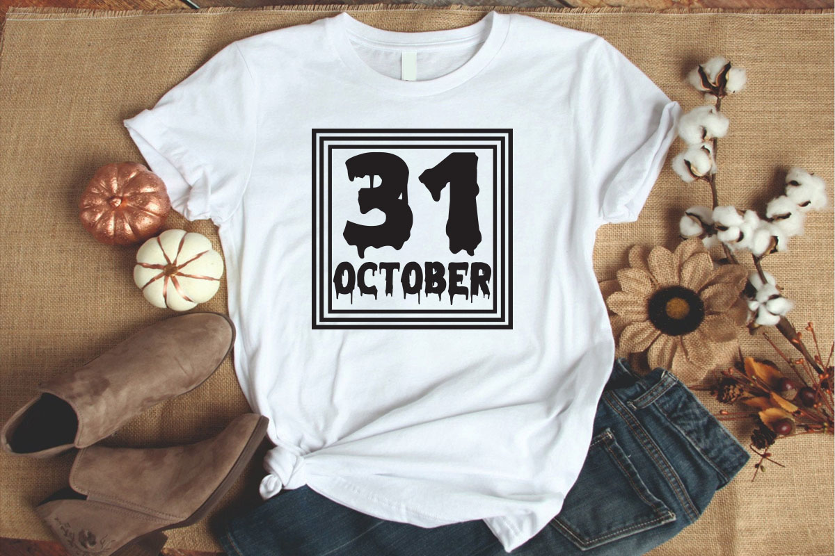 White t - shirt with the words 31st october printed on it.