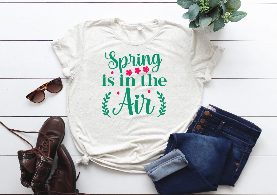 T - shirt that says spring is in the air.