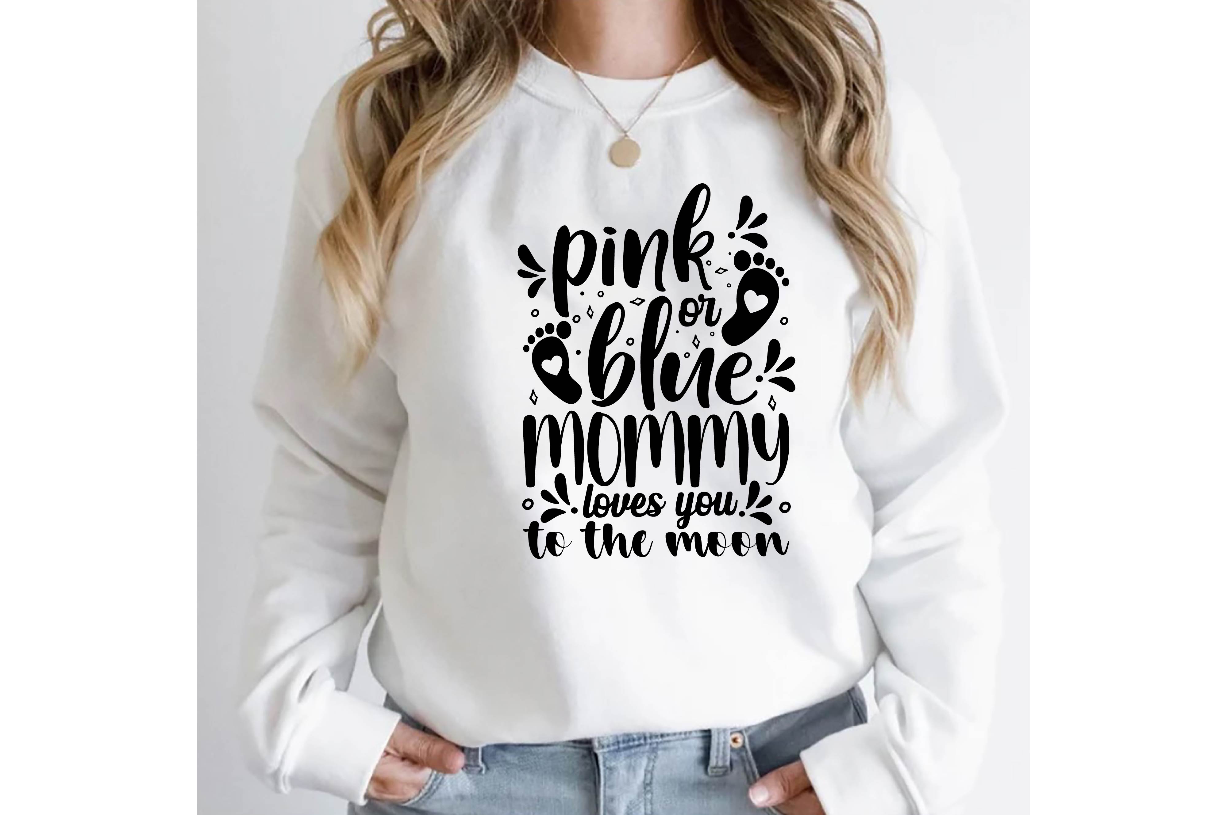 Woman wearing a white sweatshirt that says pink is the new black mommy.