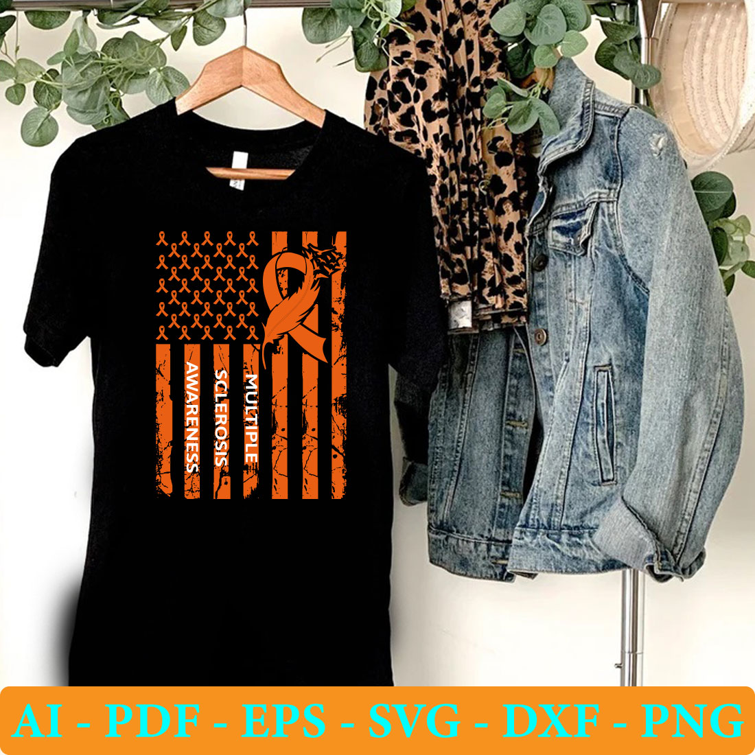 Black shirt with an orange ribbon and an american flag on it.