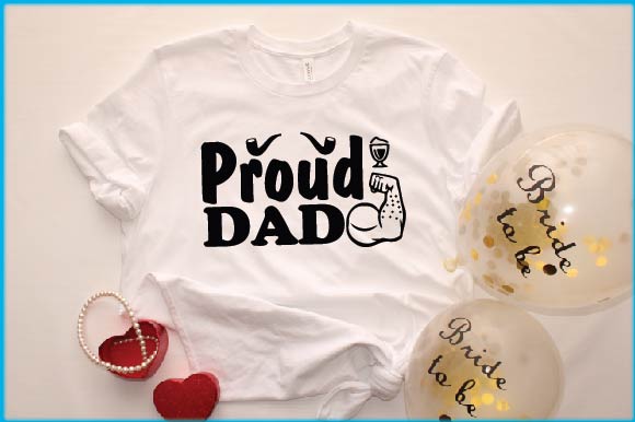T - shirt that says proud dad with balloons and confetti.
