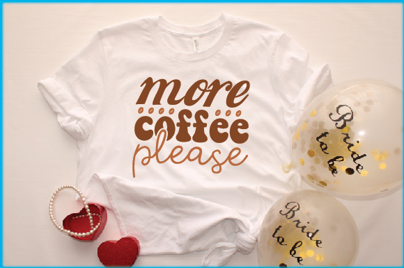 T - shirt that says more coffee please next to balloons.