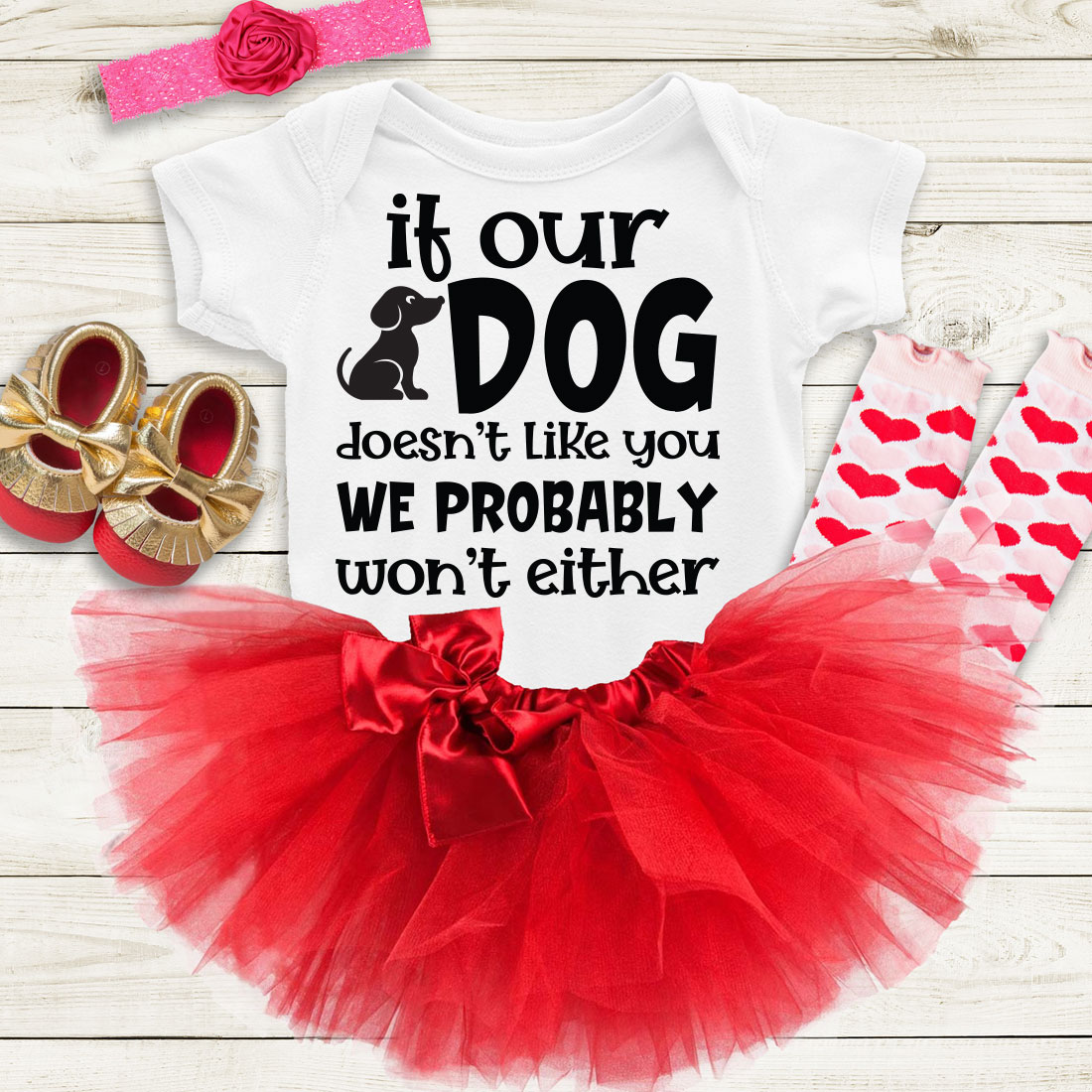 Baby girl's outfit with a red tutu and matching shoes.