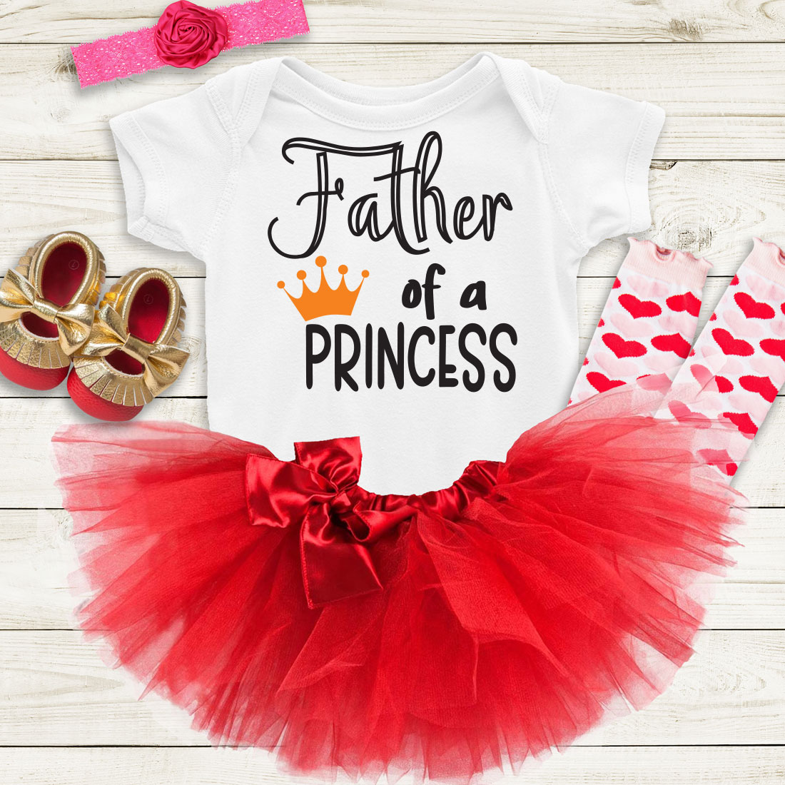 White shirt with a red tutu and a red tutu with a crown.