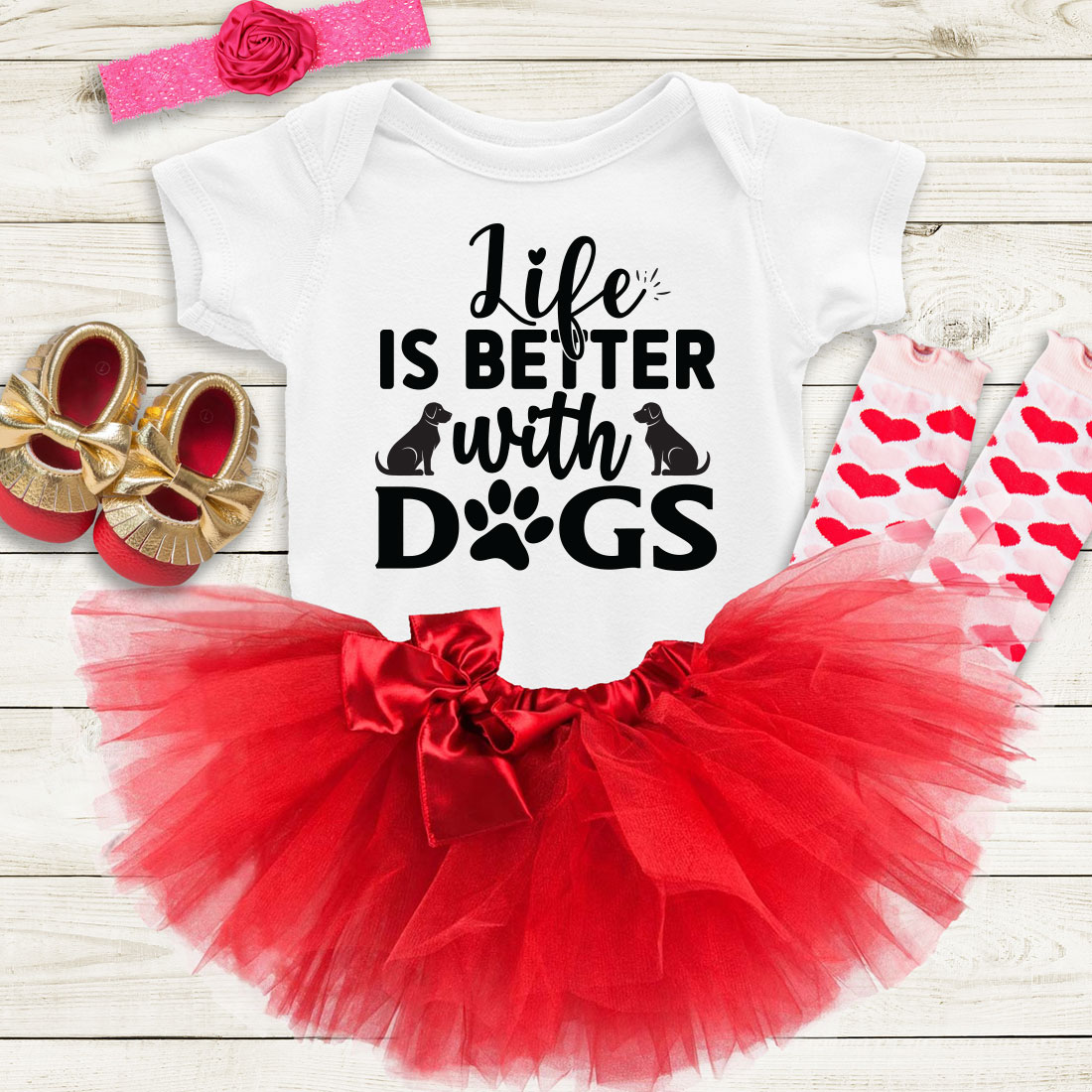 Baby girl's outfit with a red tutu and matching shoes.